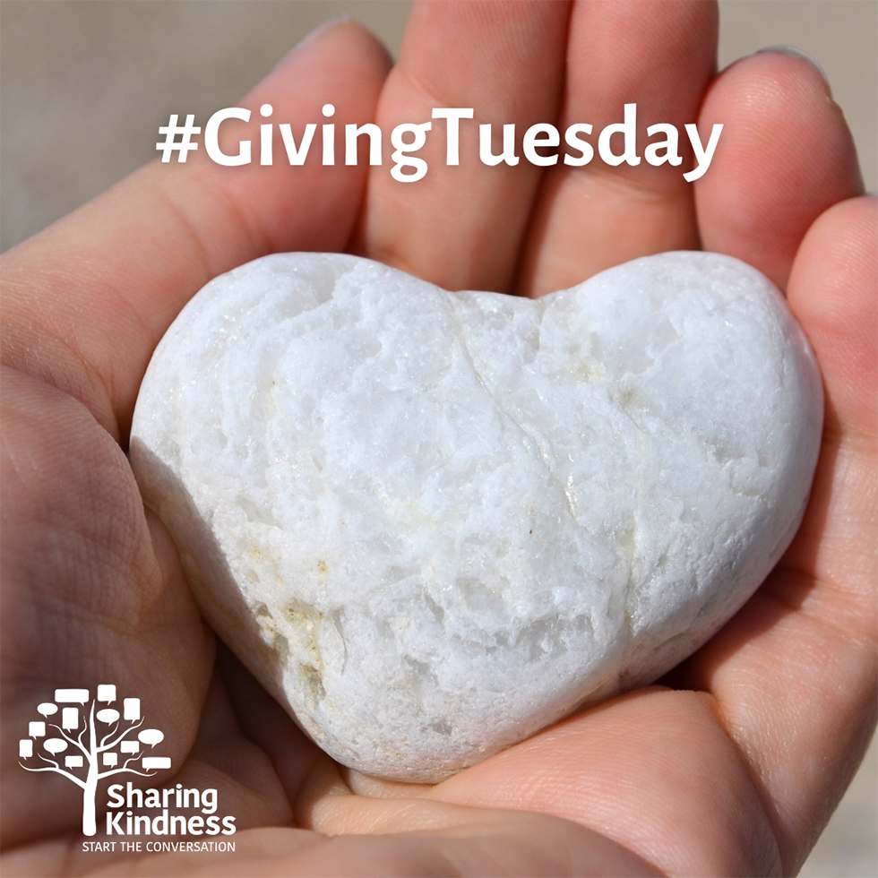 Image of hand holding a heart-shaped rock and the words "#GivingTuesday" with the Sharing Kindness logo